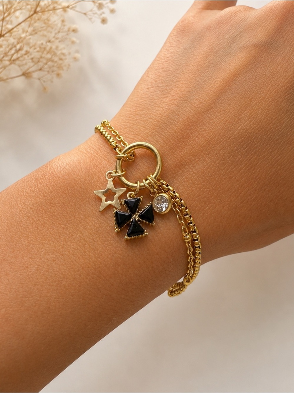 Gold Multi chain Bracelet with Black  Clover Charm